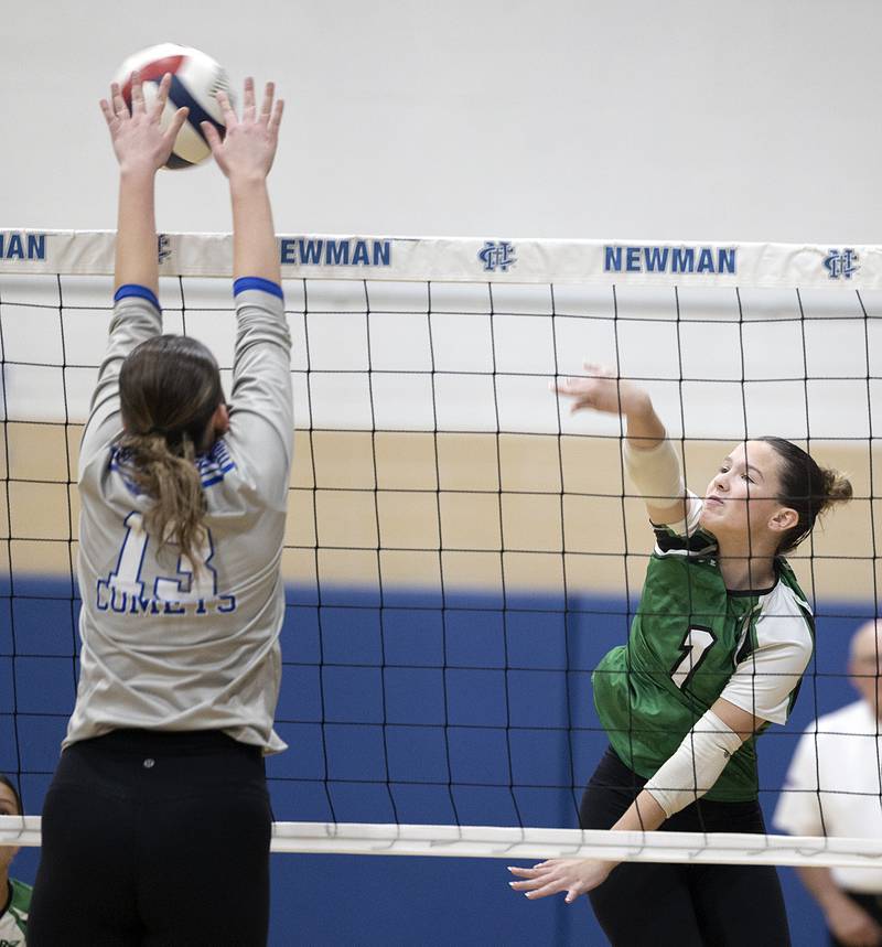 Rock Falls’ Kacie Witherow plays the ball against Newman’s Marykay Downs Monday, Oct. 28, 2024, during regional play at Newman.