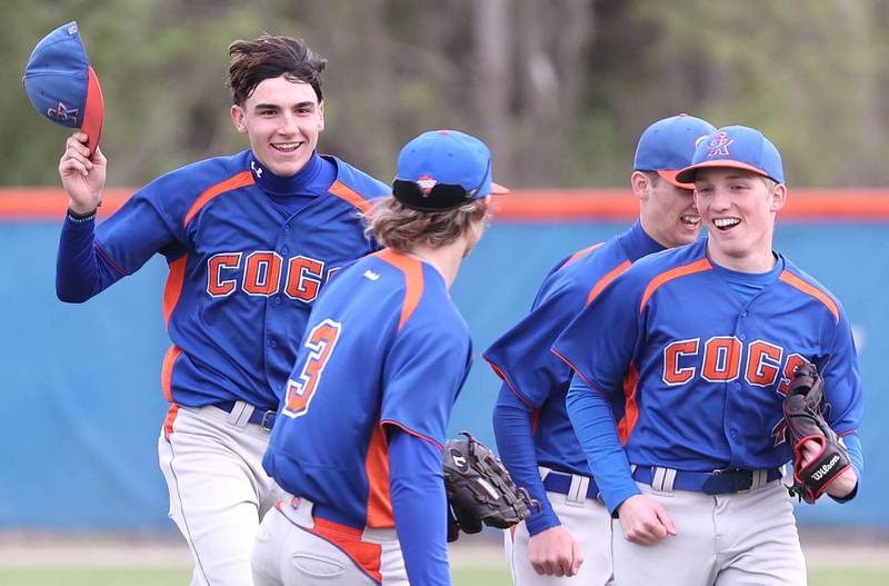 Genoa-Kingston's Justyn Ferrara (left) is greeted by his teammates after making a catch in right field during their game against Rockford Lutheran Tuesday, May 2, 2023, at Genoa-Kingston High School.