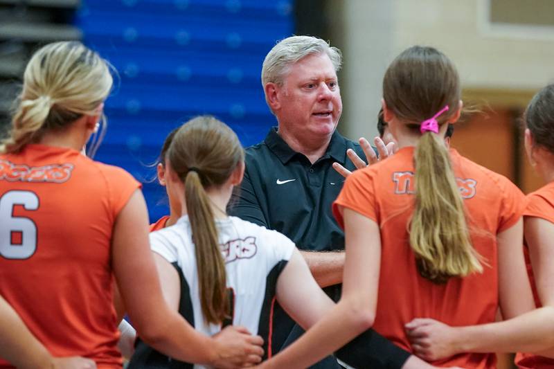Wheaton Warrenville South's head coach Bill Schreier talks to his team during a DuKane Conference match against Geneva in Geneva on Tuesday, Sept. 16, 2025.