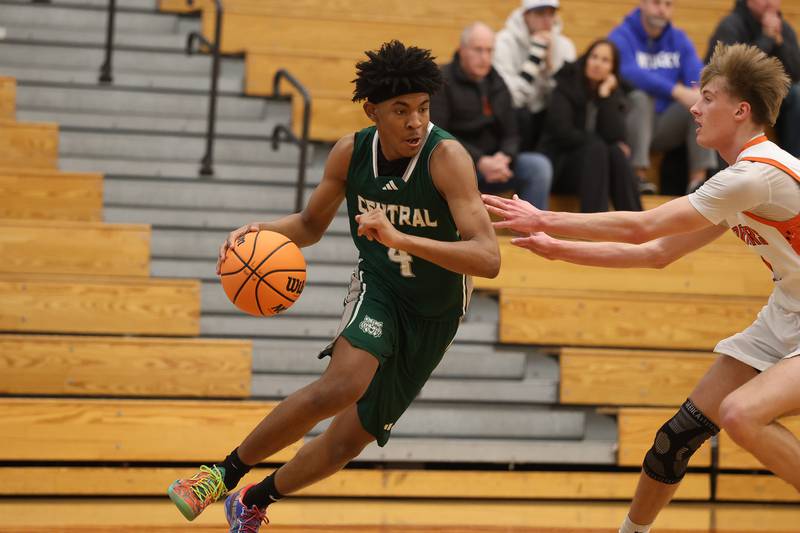 Plainfield Central’s Colby Logan drives along the baseline against Lincoln-Way West on Saturday, Jan 3, 2026 in New Lenox.