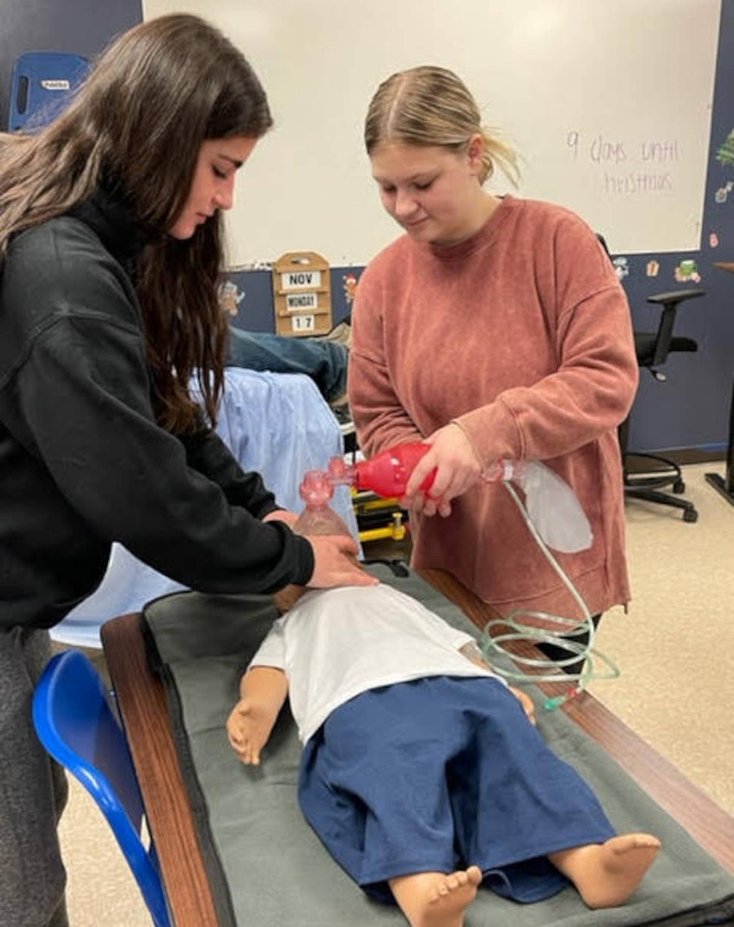 IVVC EMS students practice using a 1-Year-Old Patient Heart and Lung Sounds Skills Trainer.