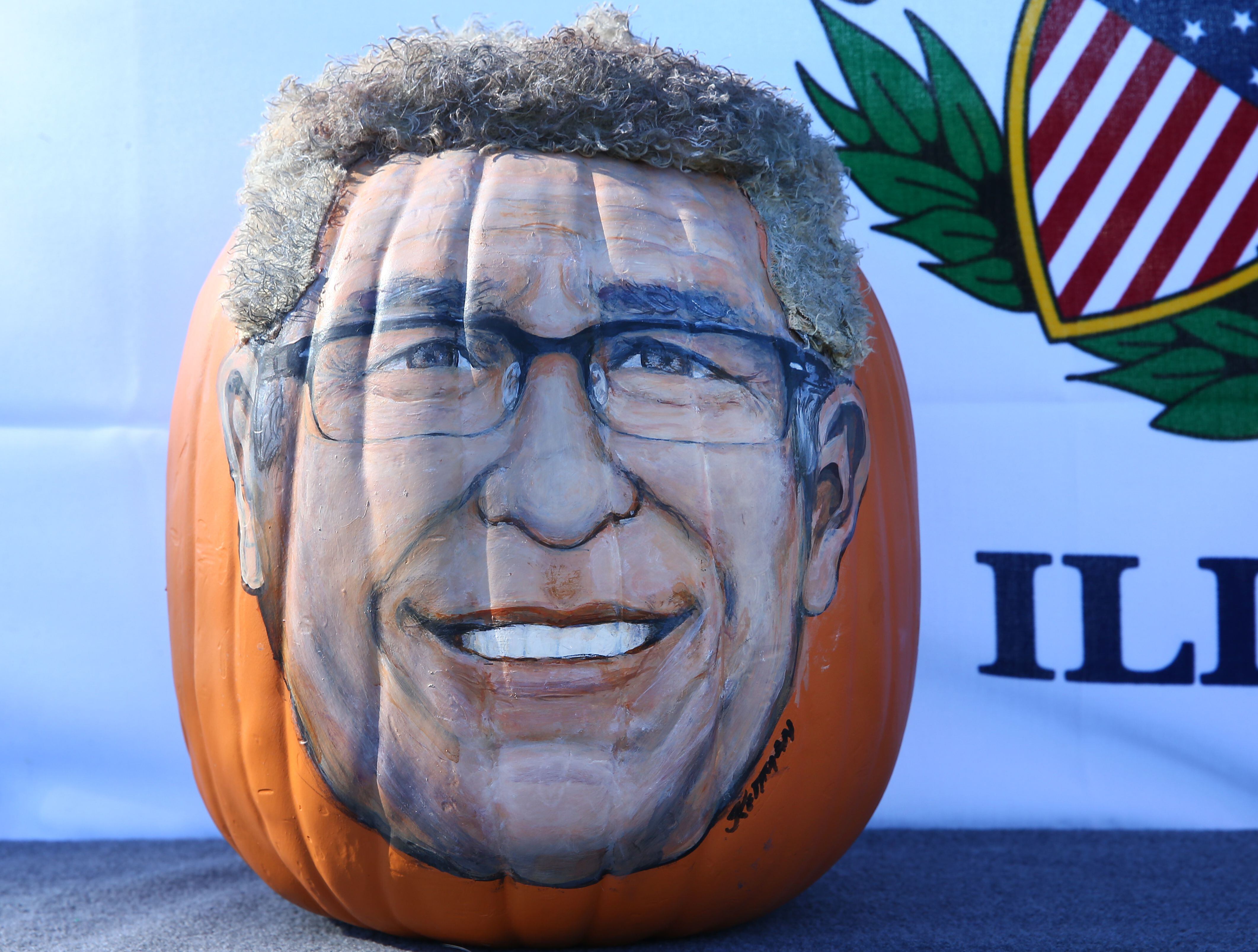 A close-up view of Republican gubernatorial candidate Darren Bailey's face on a pumpkin Wednesday, Sept. 28, 2022, at Allen Park in Ottawa.