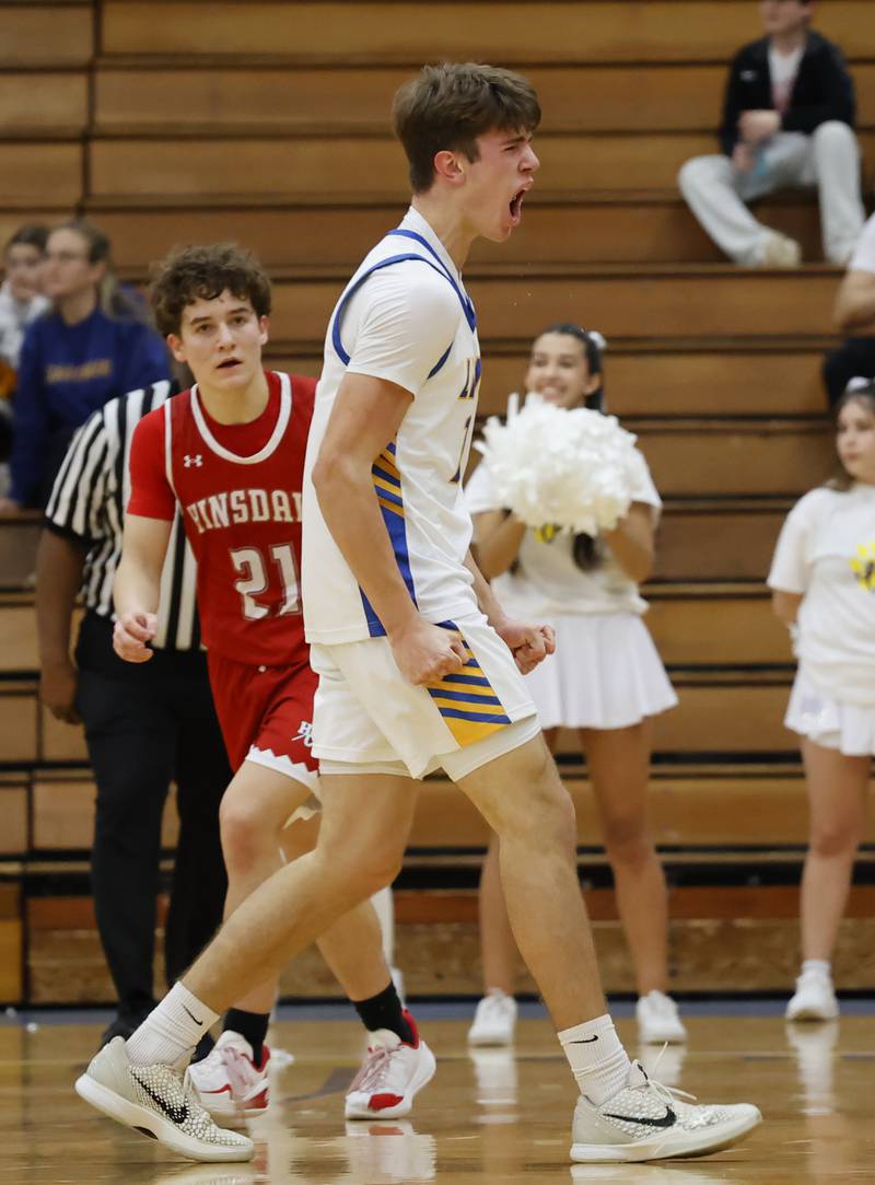 Lyons Township's Grant Smith (14) reacts to a call during a varsity basketball game between Hinsdale Central and Lyons Township high schools on Friday, Dec. 12, 2025 in La Grange.