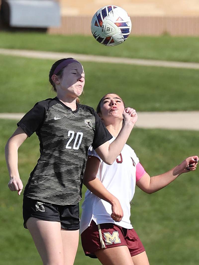 Sycamore's Cortni Kruizenga and Morris' Kendra Vasquez go for a header during their Interstate 8 Conference Tournament semifinal game Wednesday, May 3, 2023, at Sycamore High School.