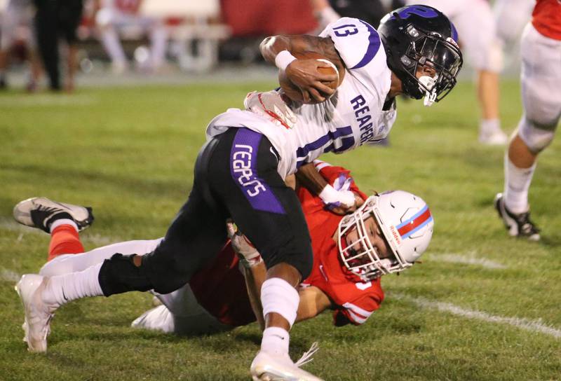 Plano's Amari Bryant stays on his feet as Ottawa's George Schumway misses the tackle on Friday, Aug. 30, 2024 at King Field.