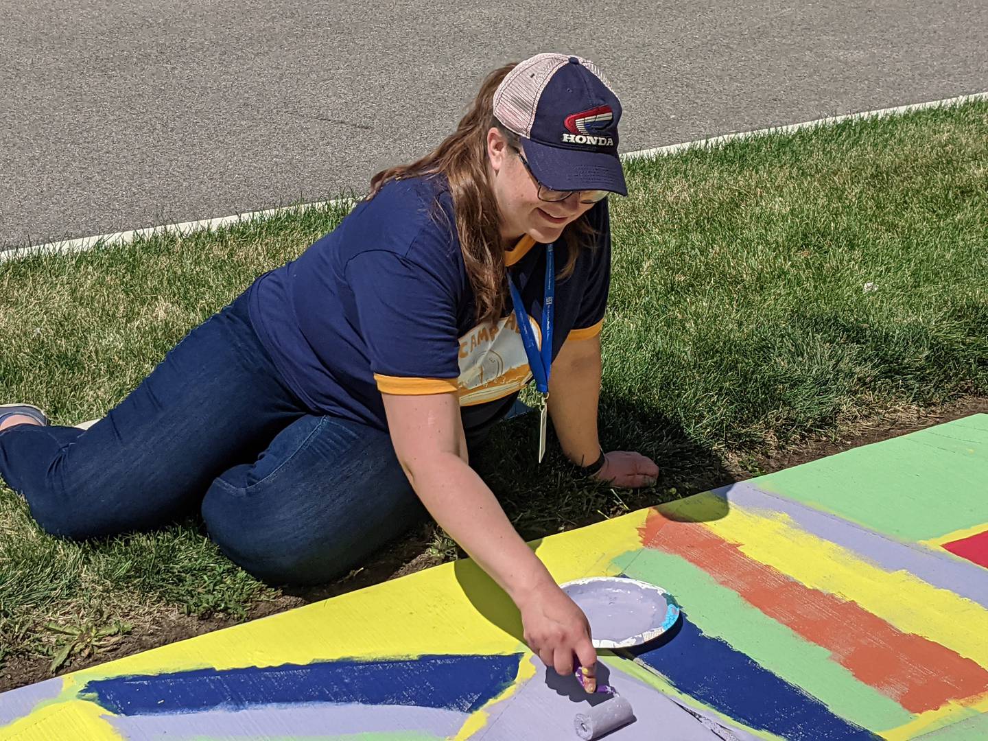 In conjunction with the Paint The Riverside project, Darcy Tatlock, middle school librarian at St. Charles Public Library, was overseeing a sidewalk painting project next to the library.