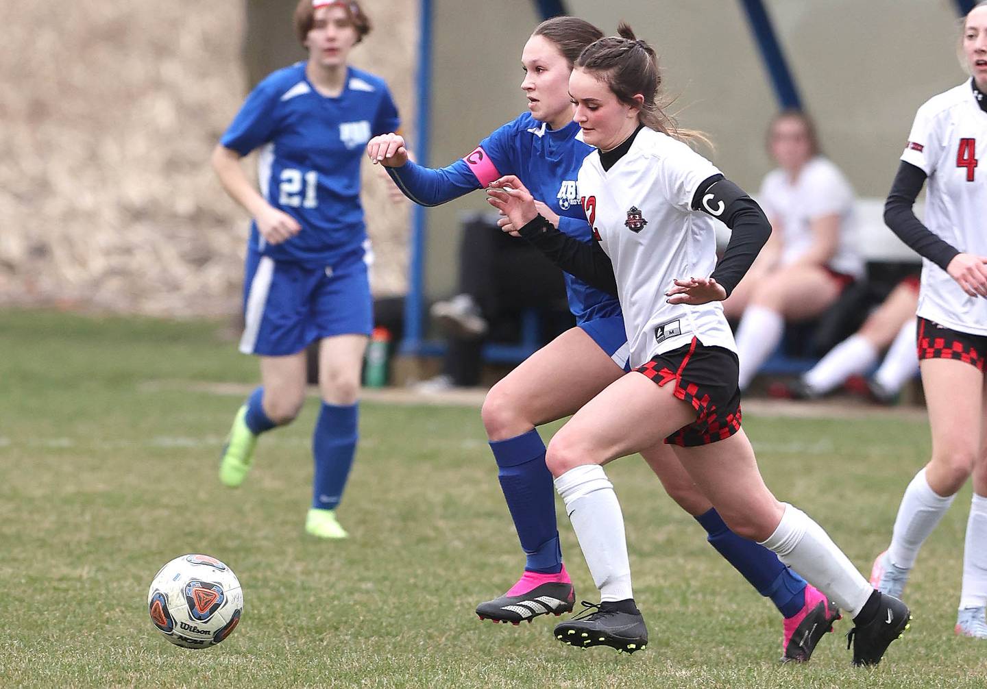 Hinckley-Big Rock-Somonauk's Josie Rader (left) and Indian Creek's Emma Turner race after the ball during their game Monday, April 3, 2023, at Hinckley-Big Rock High School.