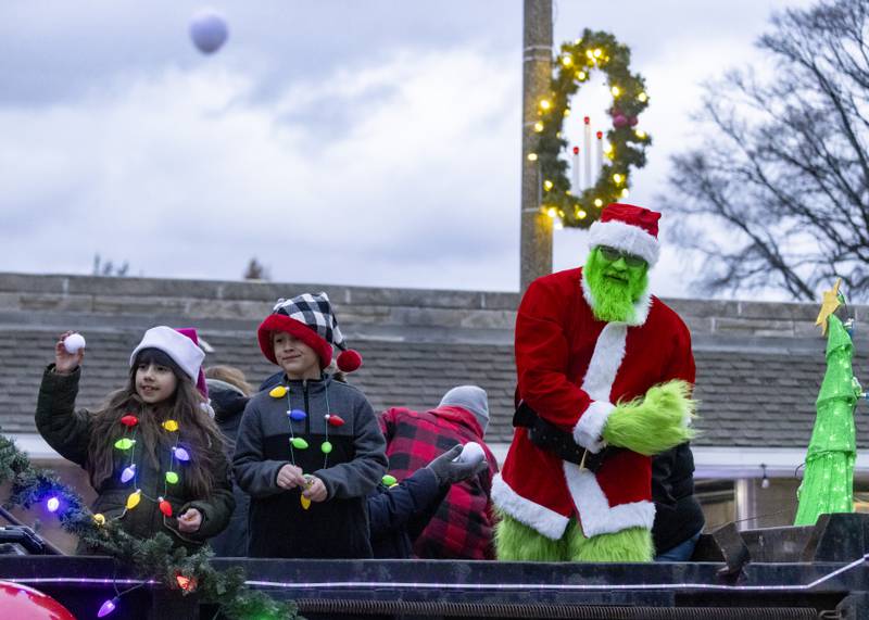 Instead of candy the Grinch threw "snowballs" out into the crowd during the Oglesby Winter Parade on December 9, 2023.