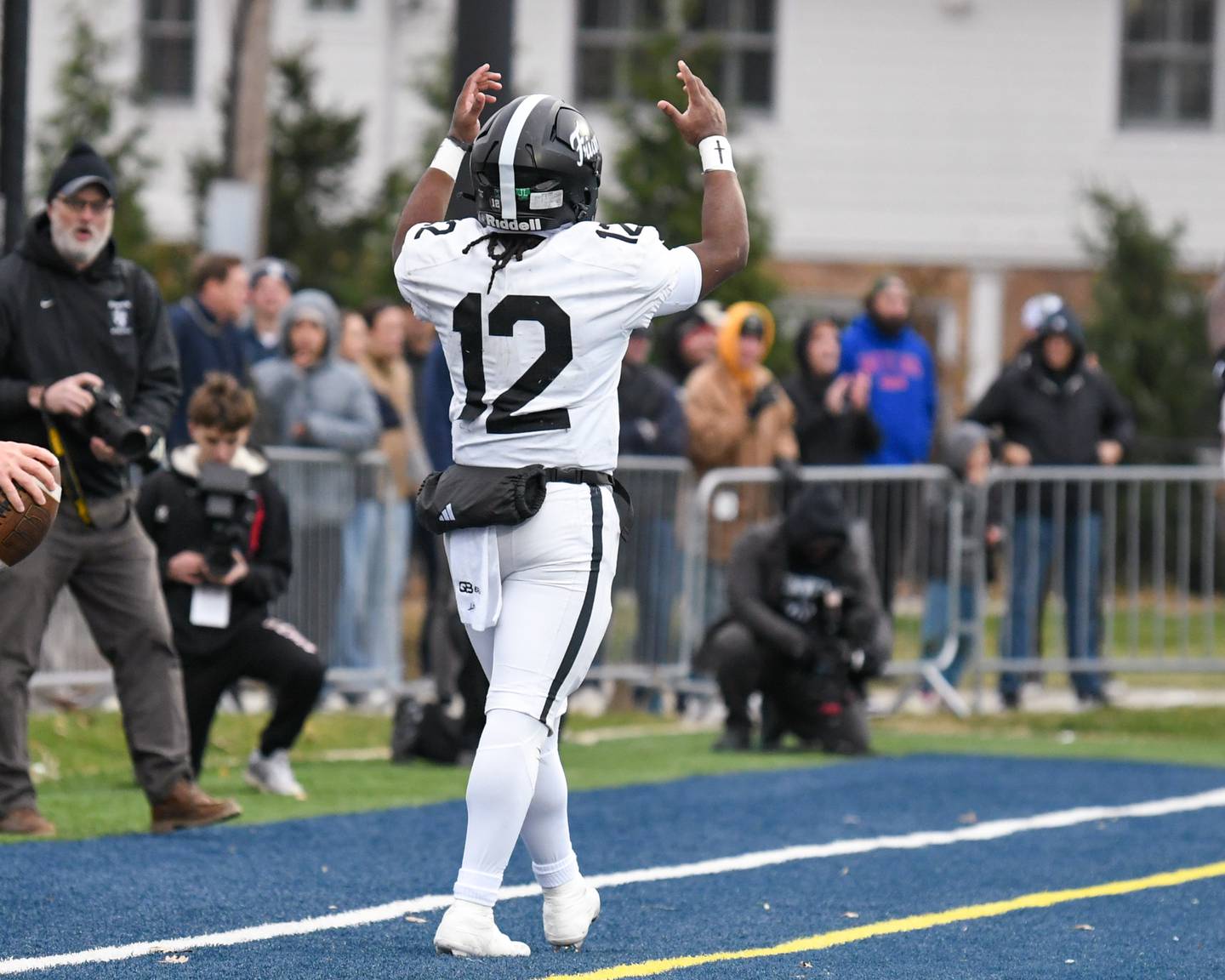 Fenwick's Jamen Williams (12) celebrates his touchdown against Nazareth Academy during the 6A semifinals game on Saturday Nov. 22, 2025, held at Nazareth Academy High School in La Grange Park.