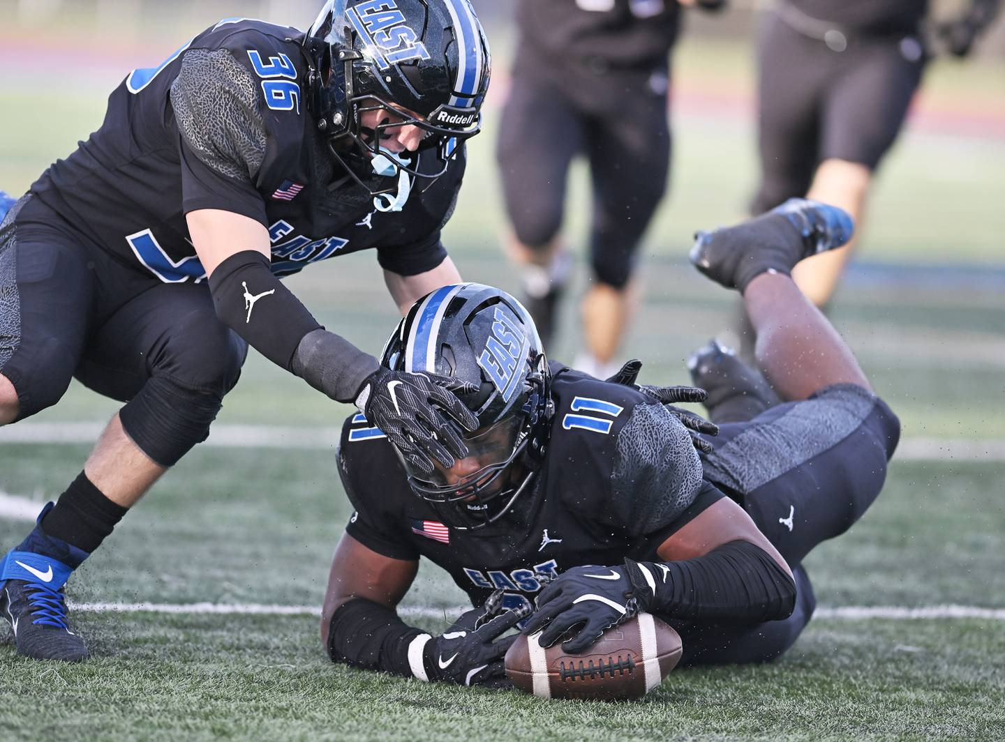 Lincoln Way East's Jacob Alexander (11) recovers a loose ball during the non-conference game against Kankakee on Friday, Sept. 05, 2025, at Frankfort.