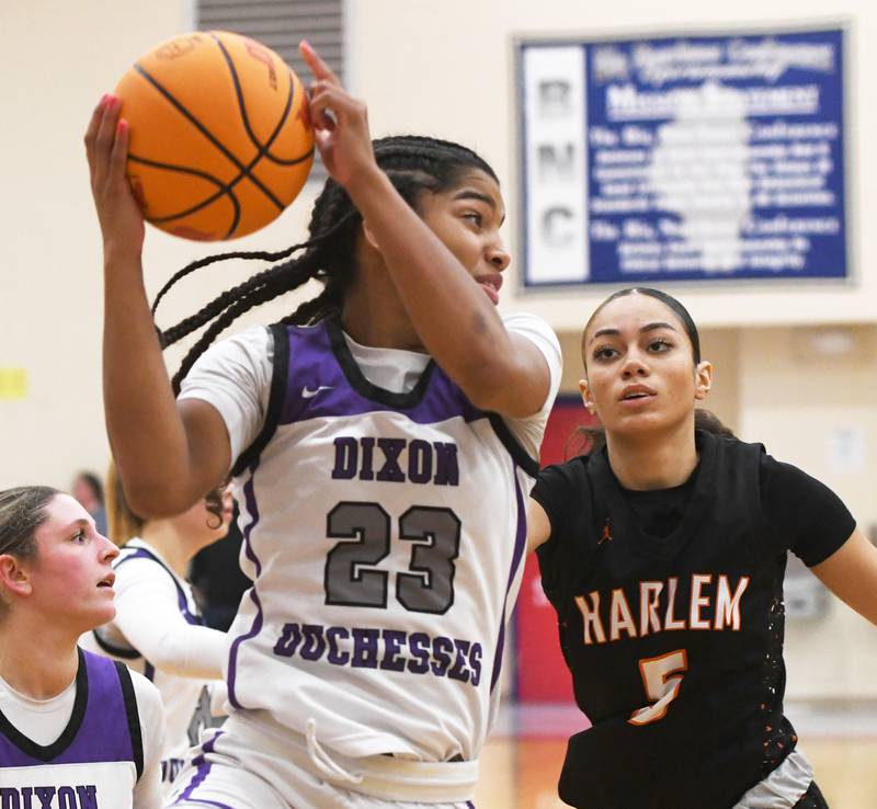 Dixon's Ahmyrie McGowan (23) rebounds against Harlem at the Oregon Girls Tip-Off Tournament on Wednesday, Nov. 19, 2025 at the Blackhawk Center in Oregon.