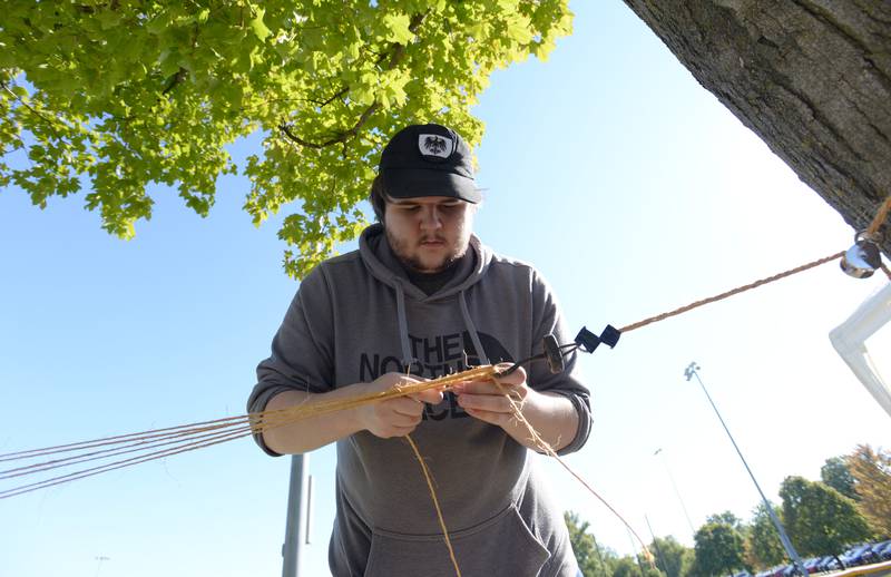 Chris Formanski of Burr Ridge makes rope during the Last Straw event held at the Gregg House Museum Sunday Oct. 2, 2022.