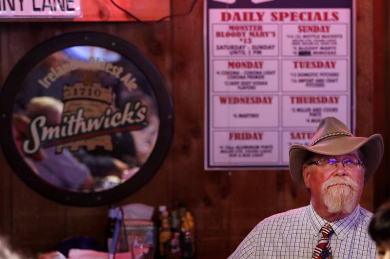 Patrick Murfin watches election results during a Democratic election watch party Tuesday, Nov. 8, 2022, at The Cottage, 6 E. Crystal Lake Ave. in Crystal Lake.