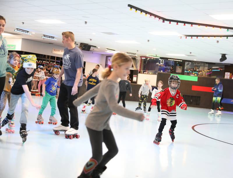 Rollerskaters take to the rink during a winter break open skate session at Funway in Batavia.