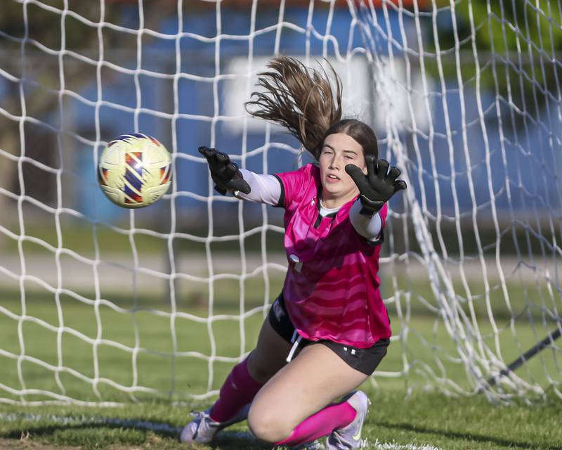 Plainfield North's Lucy Carlos (2) attempts to block a penalty kick during a soccer match between Plainfield North at Oswego on Monday, May 11, 2026 in Oswego.