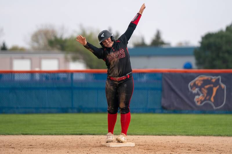 Yorkville's Kayla Kersting (10) reacts after driving in a run against Oswego during a softball game at Oswego High School on Tuesday, April 25, 2023.