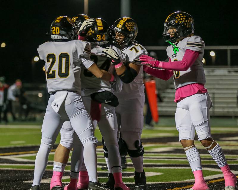 Joliet West celebrates a touchdown run by Tai’vaughn Johnson (34) during football game between Joliet West at Plainfield Central.   Oct 20, 2023.