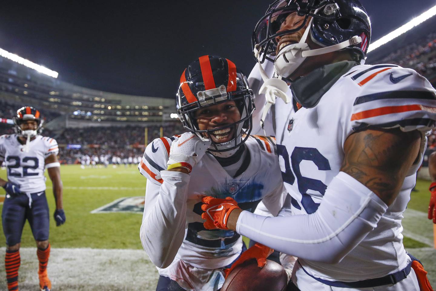Chicago Bears safety Deon Bush, right, celebrates with cornerback Thomas Graham Jr. an interception against the Minnesota Vikings during the first half Monday, Dec. 20, 2021, in Chicago.