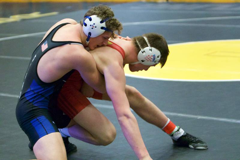 St. Charles North's Drew Surges wrestles Batavia's Jackson Tonkovich in the 182-pound championship round at the DuKane Conference at Glenbard North on Jan. 29, 2022 in Carol Stream.