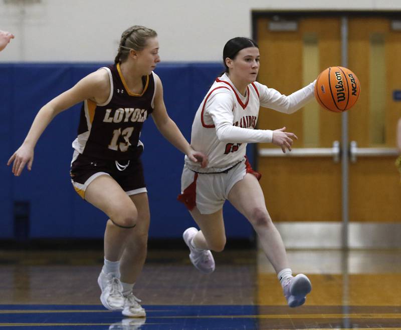 Huntley's Aubrina Adamik brings the ball up the court against Loyola Academy's Clare Leyden during the IHSA Class 4A Gurnee Warren Supersectional girls basketball game on Monday, March 3, 2025, at Warren Township High School in Gurnee.
