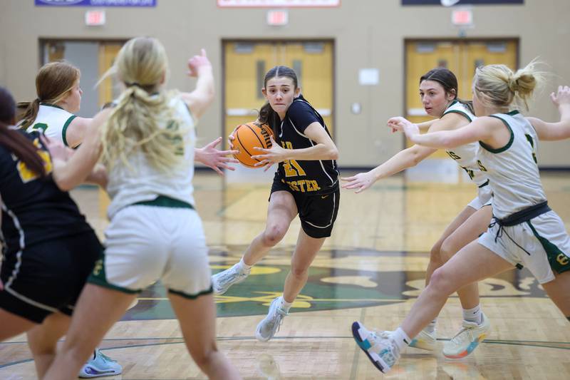 Reed-Custer's Alyssa Wollenzien makes a drive into the lane during the Comets' 50-43 victory over Coal City on Monday, Jan. 11, 2026.