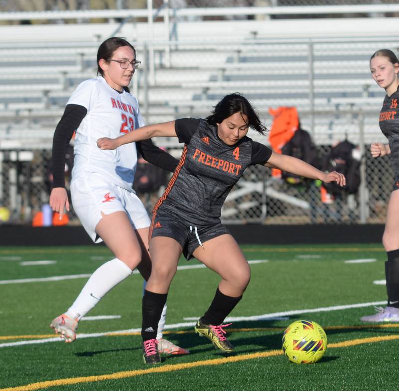 Freeport's MJ Avila (4) blocks Oregon's Arianna Hammer (23) off the ball during a Monday, March 31, 2025 game at Freeport High School.