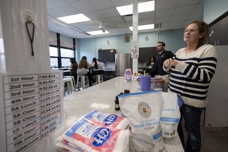Amy Heffelfinger works with her class as they make frosting for cakes at Rock Falls High School. Teachers Heffelfinger and Heidi Ripley run the Family and Consumer Sciences Department at RFHS.