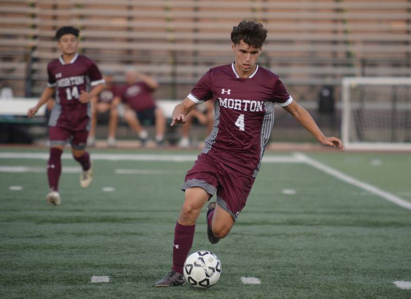 Morton West's Julian Soto controls the ball down field  against Naperville Central during their home game in Berwyn Monday, Aug. 21, 2023.