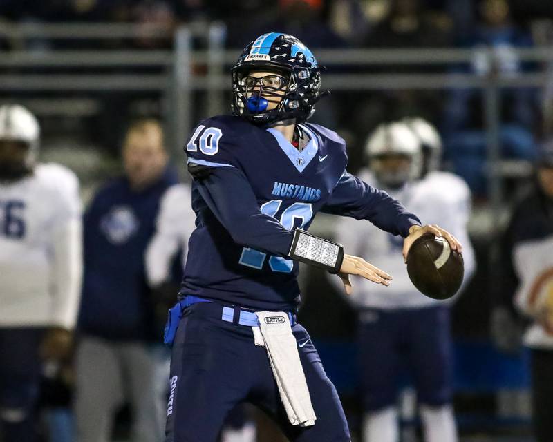 Downers Grove South's Dominic West (10) drops back to pass during Class 8A Playoff football game between Plainfield South at Downers Grove South on Friday, Nov 1, 2024  in Downers Grove.