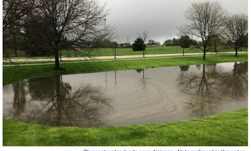 An example of standing water that illustrates the storm water drainage problems in Geneva. A three-year study shows 25 areas need storm drain infrastructure improvements.
