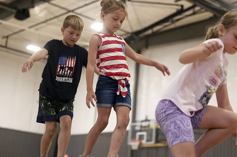 After a time of crafting slime and ice cream, kid campers burn off energy at the Facility Wednesday, May 31, 2023.
