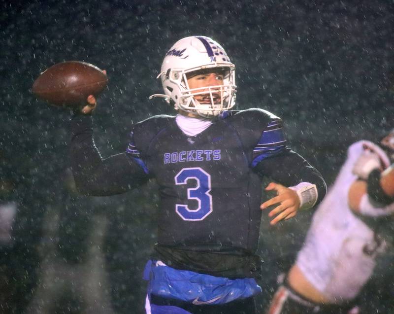 Burlington Central’s Landon Arnold looks for an option against Harlem in IHSA football Class 6A second-round playoff action at Central High School in Burlington on Saturday, November 8, 2025.