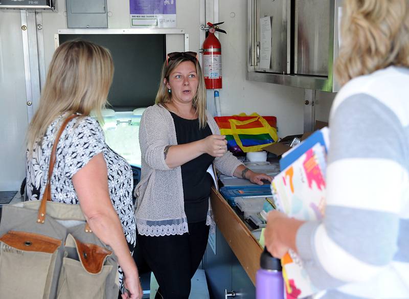 Stefanie Gattone, the McHenry County program manager for Live4Lali, explains what supplies they carry on their truck during a tour of the truck before a meeting Monday, June 27, 2022, of the McHenry County Substance Abuse Coalition in Crystal Lake. Live4Lali is one of nearly 60 agencies being asked how McHenry County should spend the Big Pharma settlement in battling opioid addiction in McHenry County.
