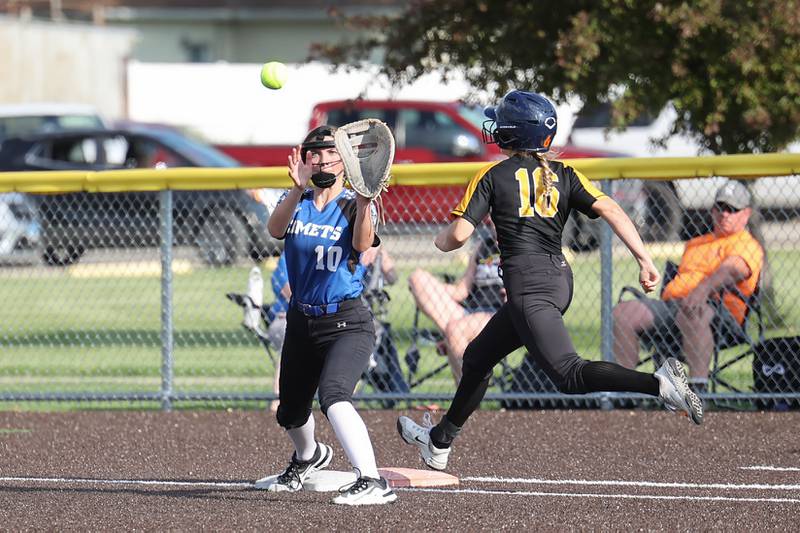 Herscher's Addy Whitaker beats the throw to Central's Ella Ponton at first base during the Tigers' 13-6 victory against Central on Wednesday, May 14, 2025.