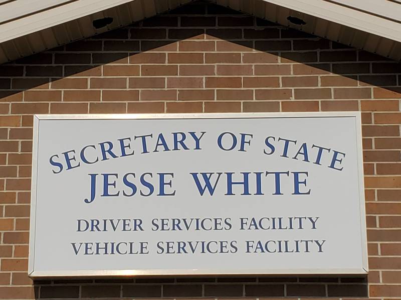 Pictured is the sign for the Secretary of State driver and vehicle services facility in Joliet, Illinois.