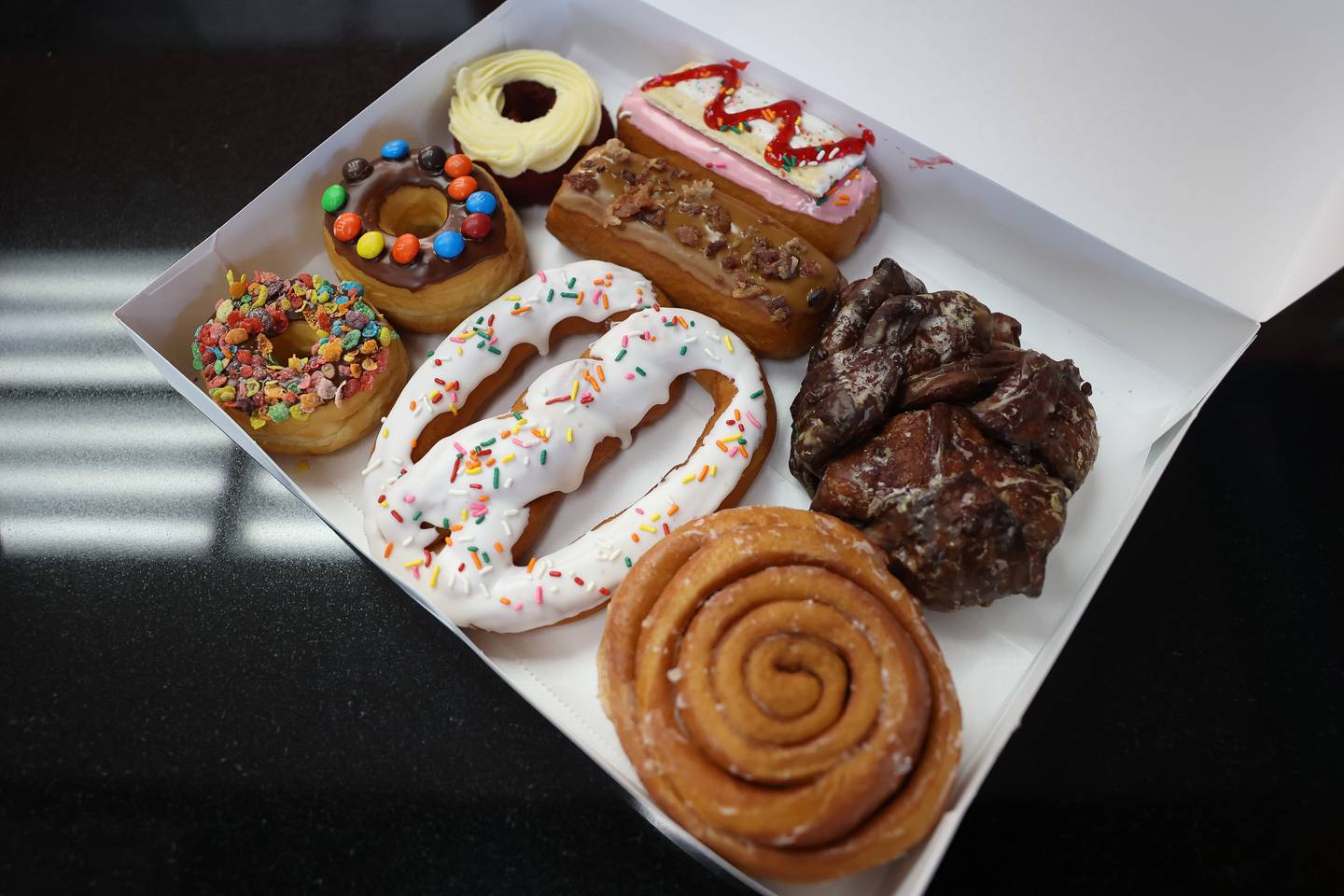 A box is filled with a variety of doughnuts at The Donut Shop on Wednesday, Sept. 13, in Lockport.