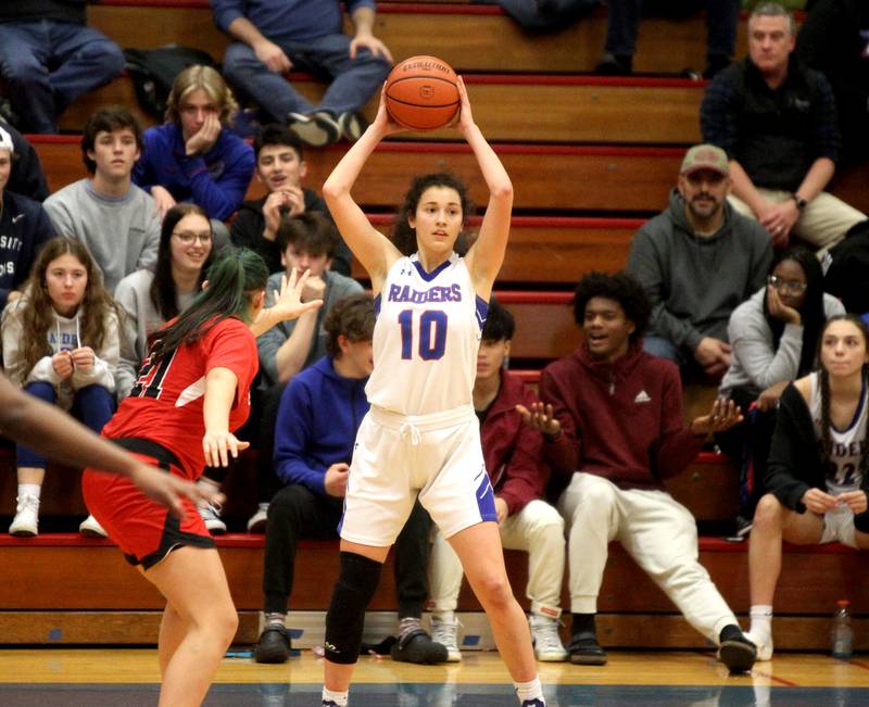 Glenbard South’s Sofia Alcala looks to pass the ball during a game against East Aurora at Glenbard South in Glen Ellyn on Thursday, Jan. 26, 2023.