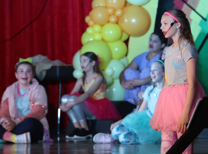 Alayna Pinter acts out a scene while performing in "Godspell  Jr." on Friday, March 27, 2026 at The Academy of Saints Carlo Acutis school in Oglesby.