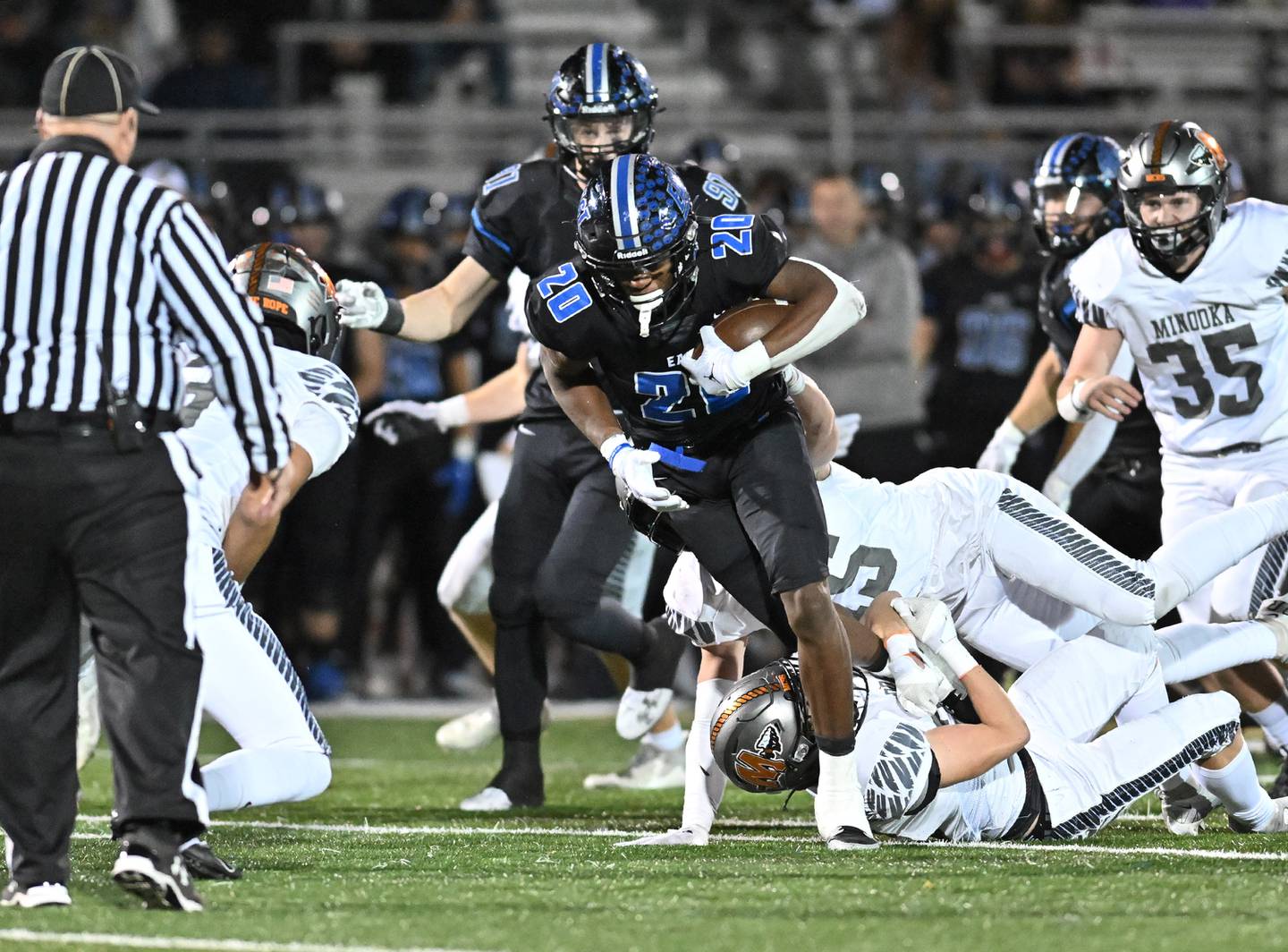 Lincoln-Way East's Zion Gist runs for a first down during the class 8A second round playoff game against Minooka on Friday, Nov. 03, 2023, at Franfort. (Dean Reid for Shaw Local News Network)