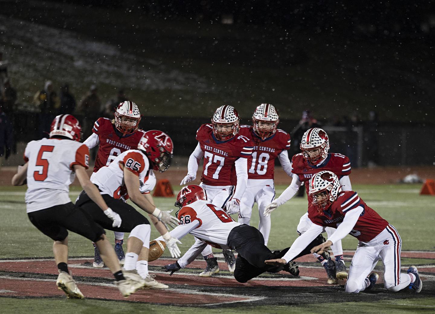 Amboy’s Geo Gatza looks cannot recover an onside kick Friday, Nov. 18, 2022 in the 8-man championship football game against West Central.