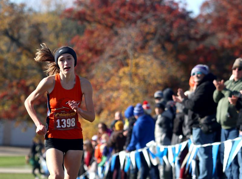 Sandwich’s Sundara Weber wins a girls Class 2A Sectional Cross Country Meet at Emricson Park in Woodstock Saturday.