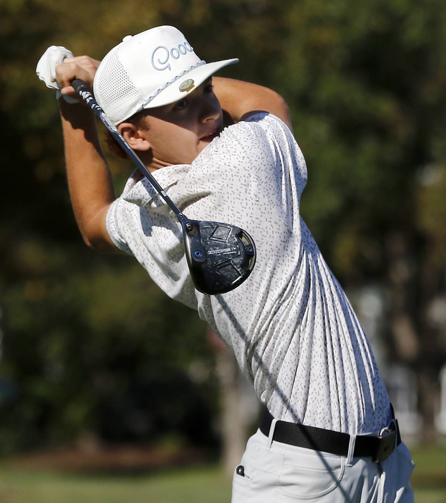 Jacobs’ Logan Henning watches his tee shot on the 7th hole during the Fox Valley Conference Boys Golf Tournament Thursday, Sept. 25, 2025, at Foxford Hills Golf Club in Cary.