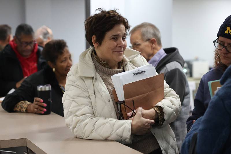 Will County Executive Jennifer Bertino-Tarrant waits in line to file her petition for the 2024 county elections. at the Will County Building in downtown Joliet on Monday, Nov. 27, 2023.