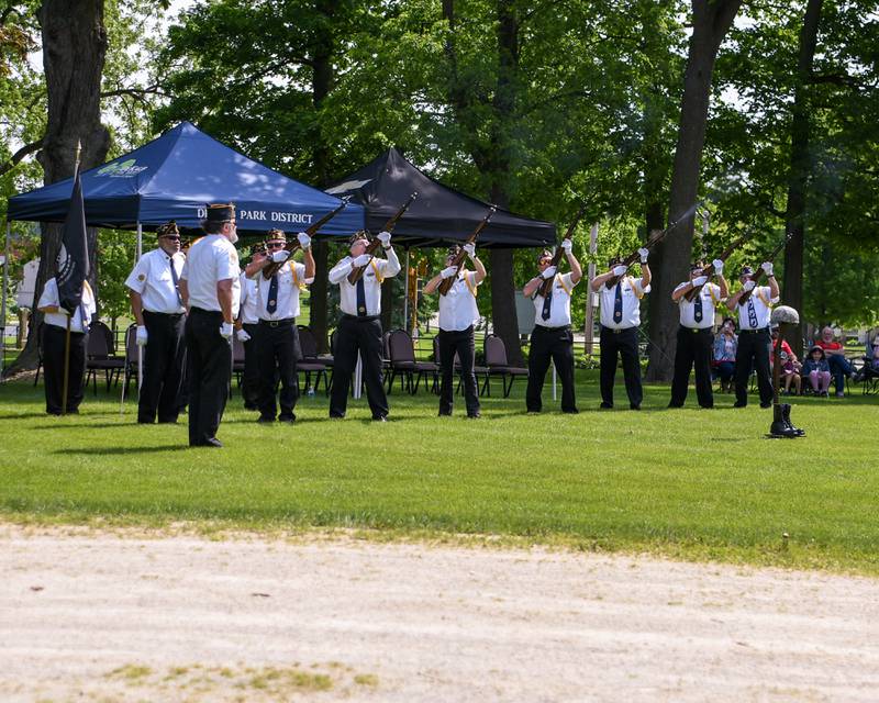 DeKalb's Honor guard presents a 21 gun salute during the Memorial day ceremony held on the Ellwood House lawn in DeKalb on Monday May 30th.