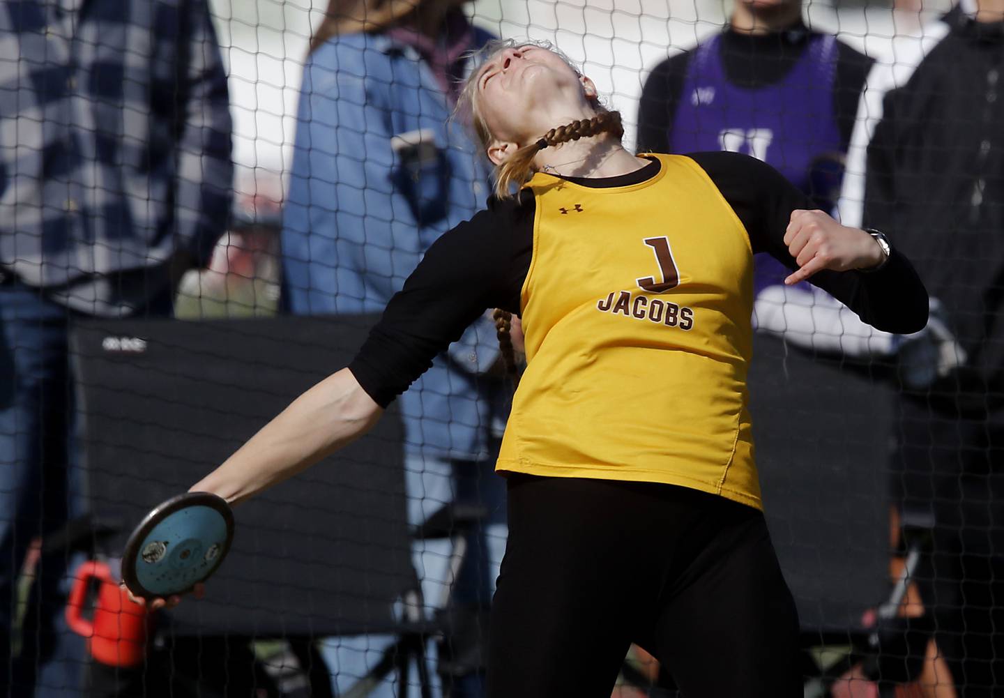 Jacobs’s Carly Uehlein throws the discus  on Thursday, May 7, 2026, during the Fox Valley Conference Girls Track and Field Meet at Huntley High School.