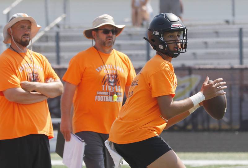 Crystal Lake Central’s Aidan Neiderkorn throws a pass during a 7 on 7 football practice Monday, July 14, 2025, at Richmond-Burton High School, with teams from Richmond-Burton . Grayslake Central and Mundelein.