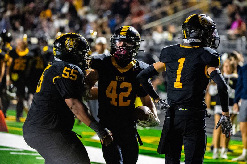 Joliet West celebrates a touchdown scored by Gavin Garcia during a game against Plainfield South on Friday Sept. 29, 2023 at Joliet West High School in Joliet