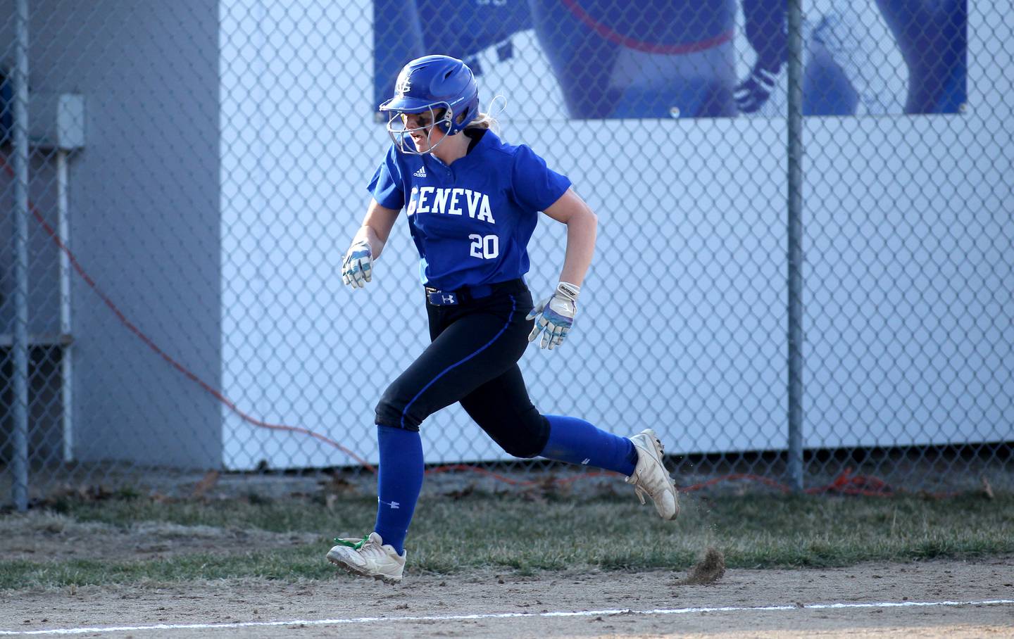 Geneva’s Brianna Venditti runs home during a game at West Aurora during a home game on Wednesday, March 16, 2022.