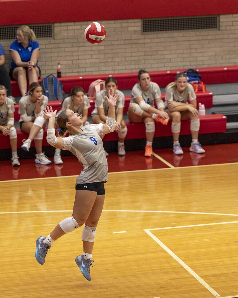 Ava Kyle (9) of Princeton jumps to serve volleyball to Ottawa on Thursday, Sept. 18, 2025 at Ottawa High School in Ottawa.