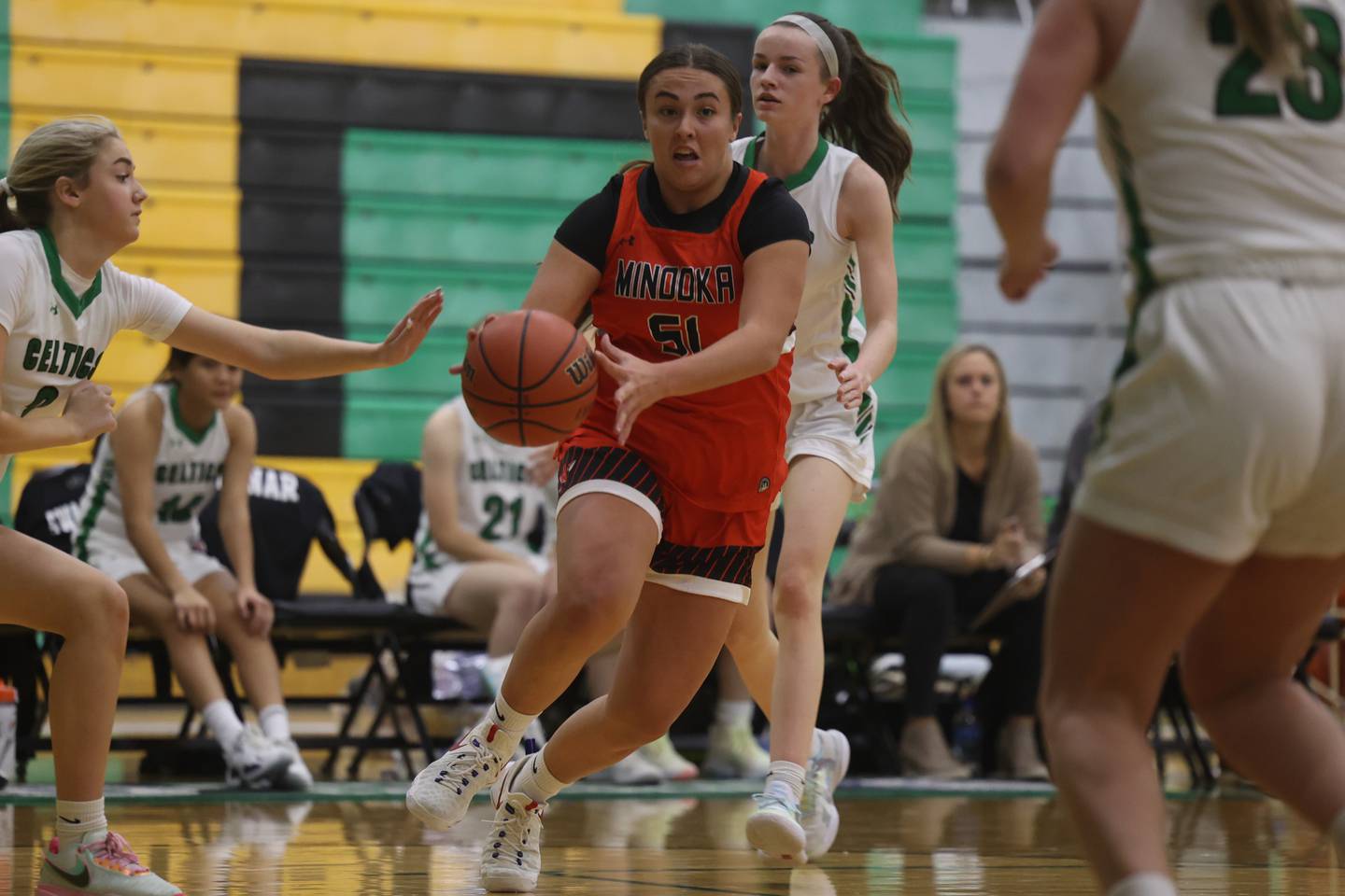Minooka’s Kaitlyn Lavezzi drives to the paint against Providence in the WJOL Basketball Tournament on Wednesday.
